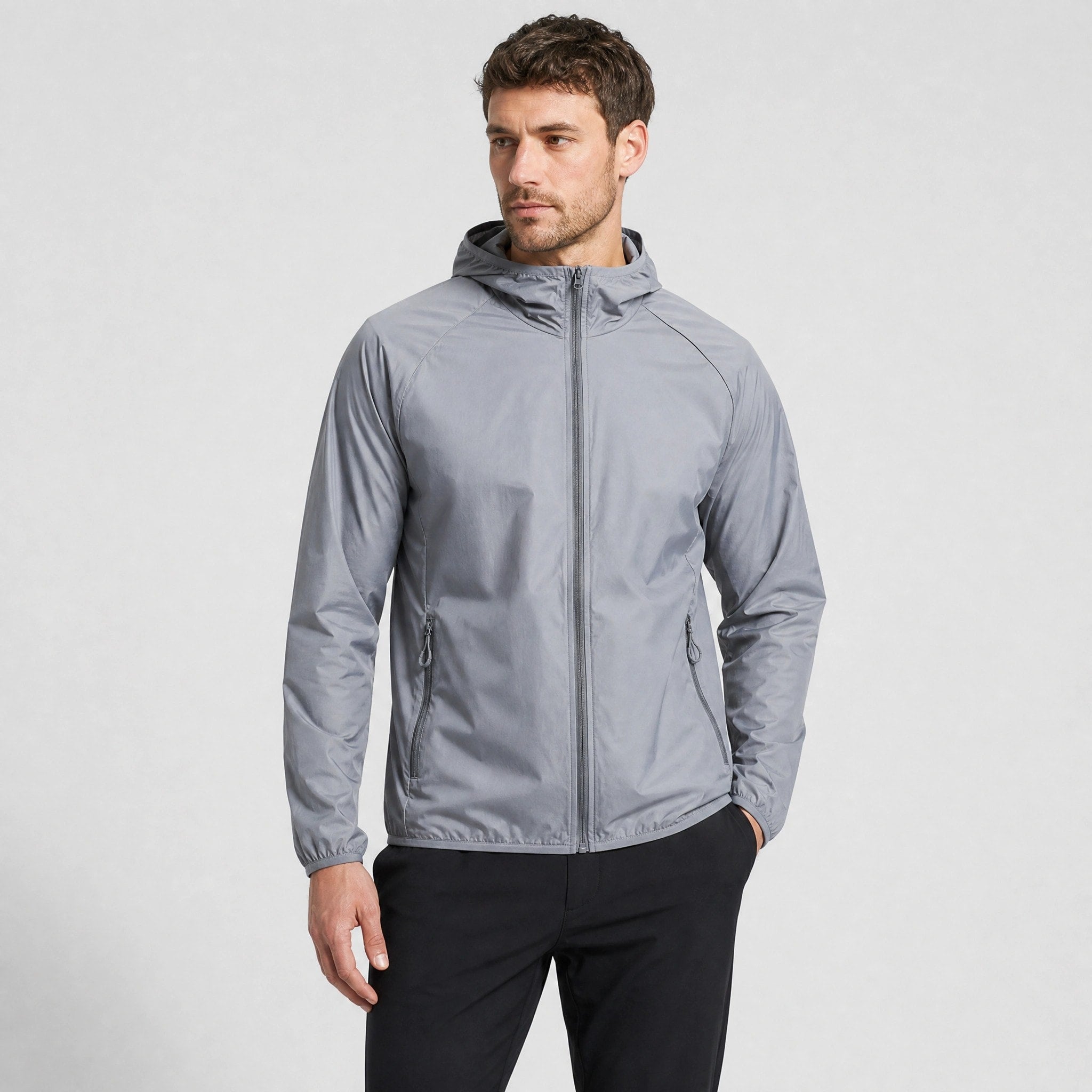 Veste pliable avec protection UV, capuche, tissu à séchage rapide et poches zippées