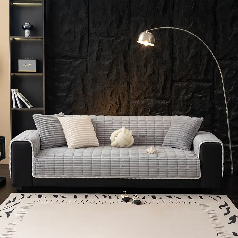 Housse de canapé en flanelle imperméable avec dos antidérapant et design lavable