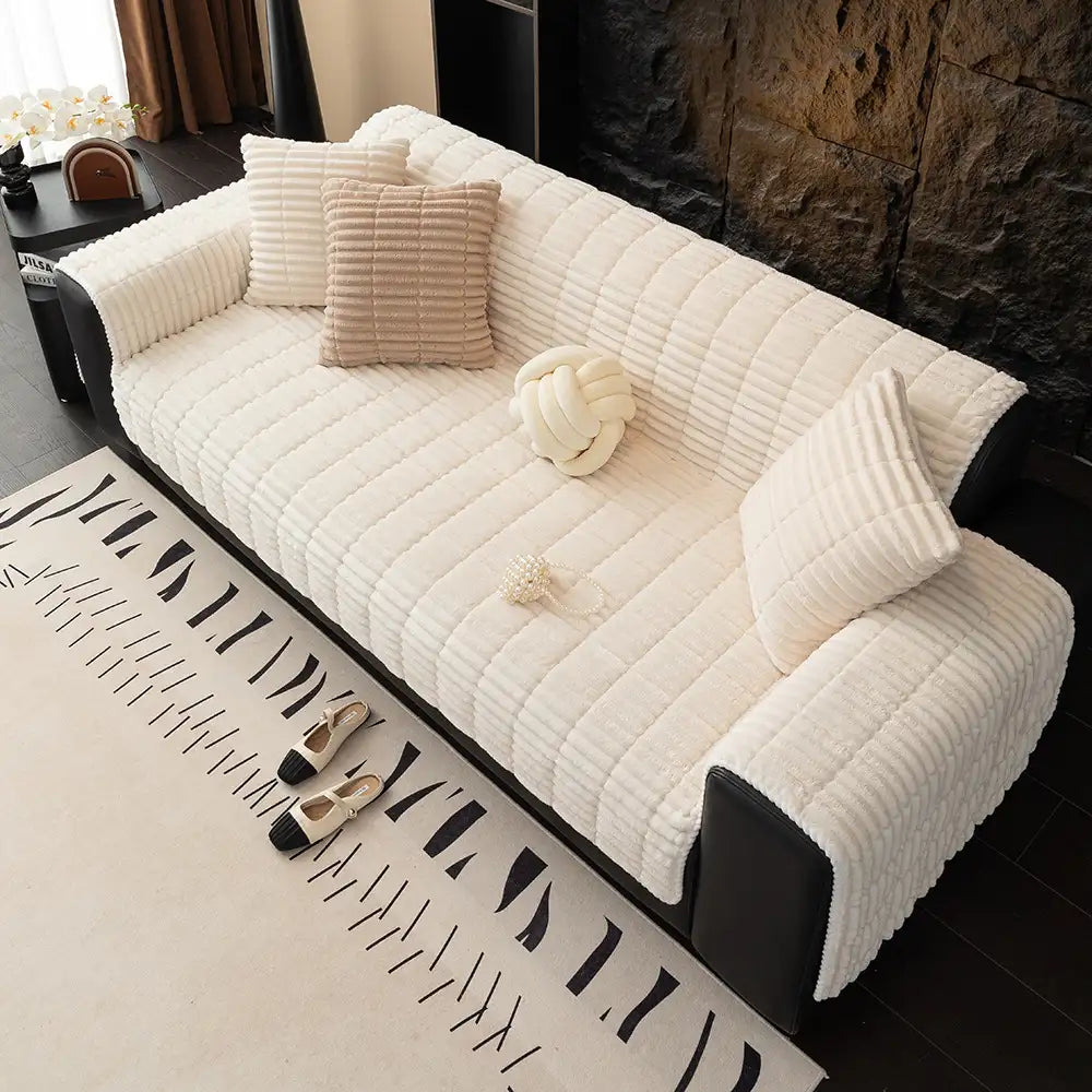 Housse de canapé en flanelle imperméable avec dos antidérapant et design lavable