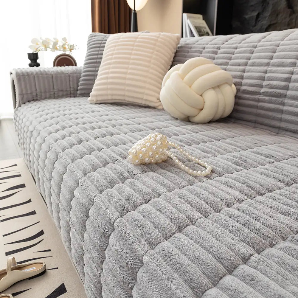 Housse de canapé en flanelle imperméable avec dos antidérapant et design lavable