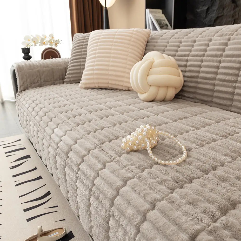 Housse de canapé en flanelle imperméable avec dos antidérapant et design lavable