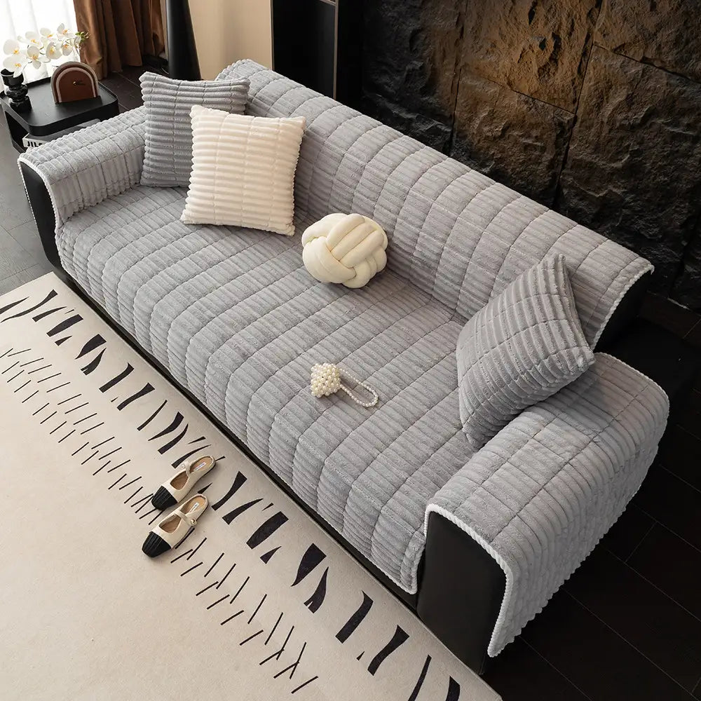 Housse de canapé en flanelle imperméable avec dos antidérapant et design lavable