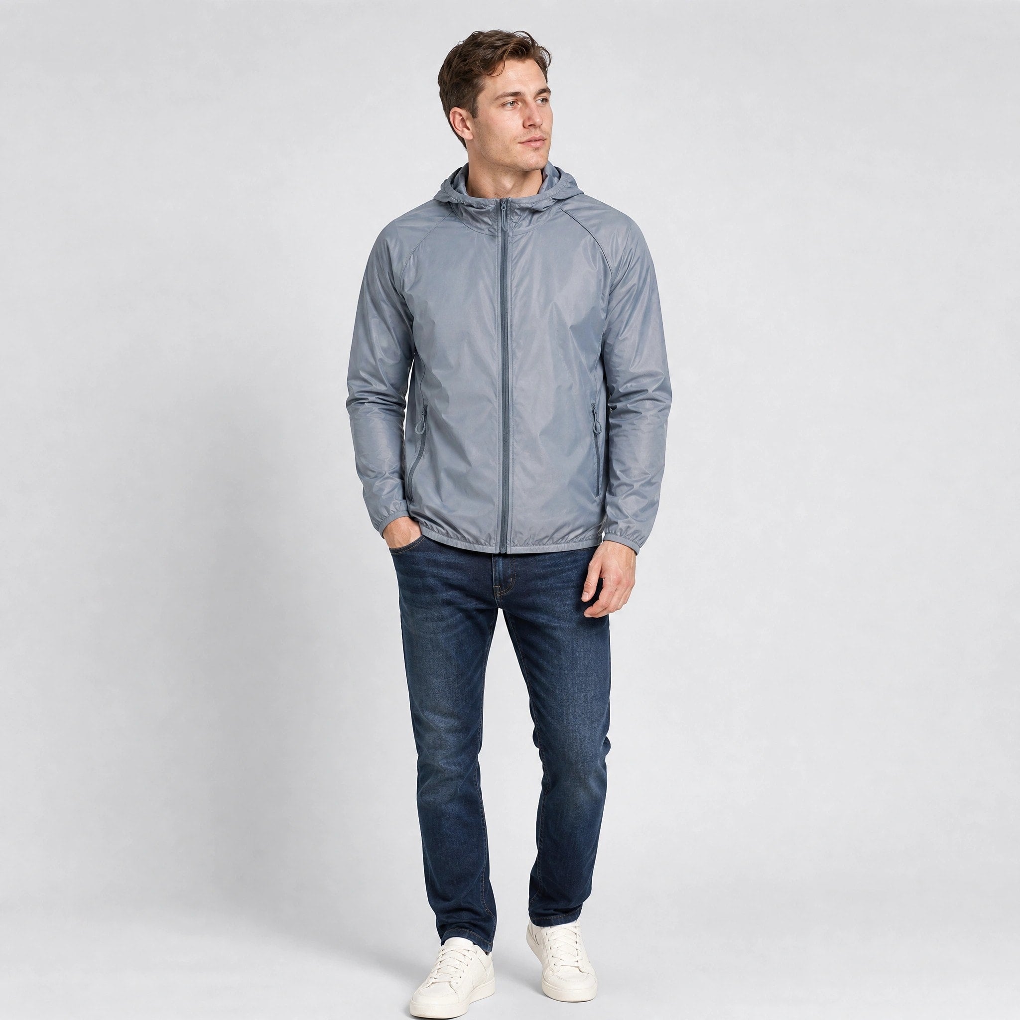 Veste pliable avec protection UV, capuche, tissu à séchage rapide et poches zippées