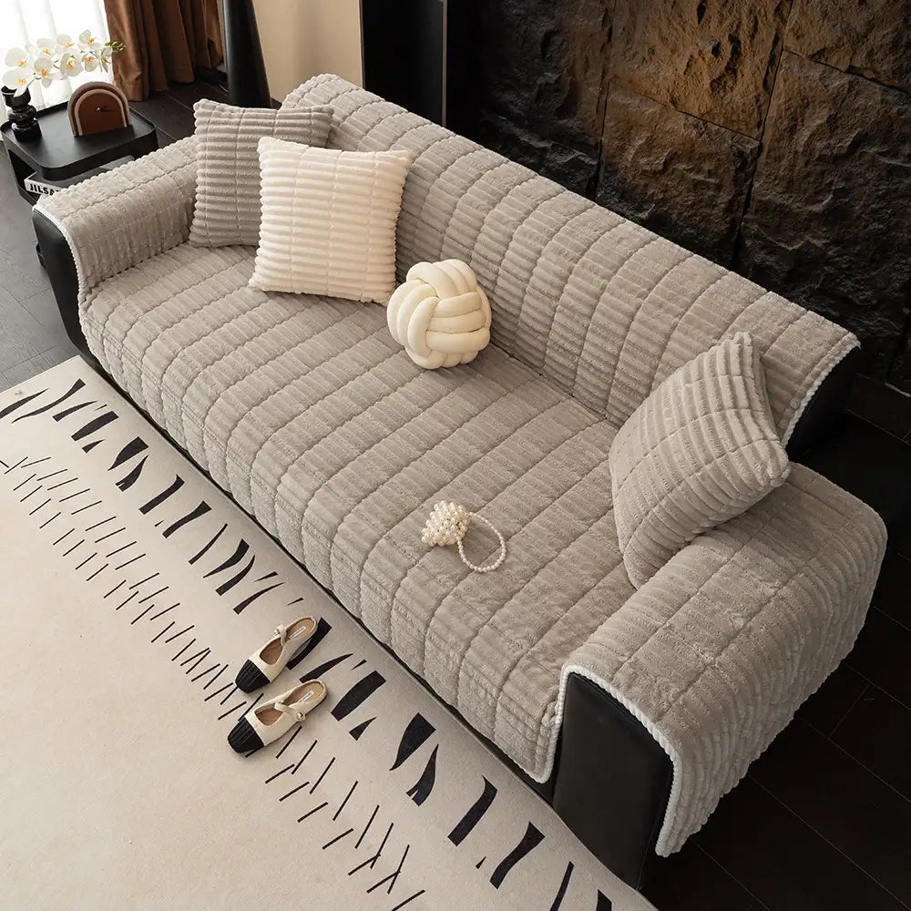 Housse de canapé en flanelle imperméable avec dos antidérapant et design lavable